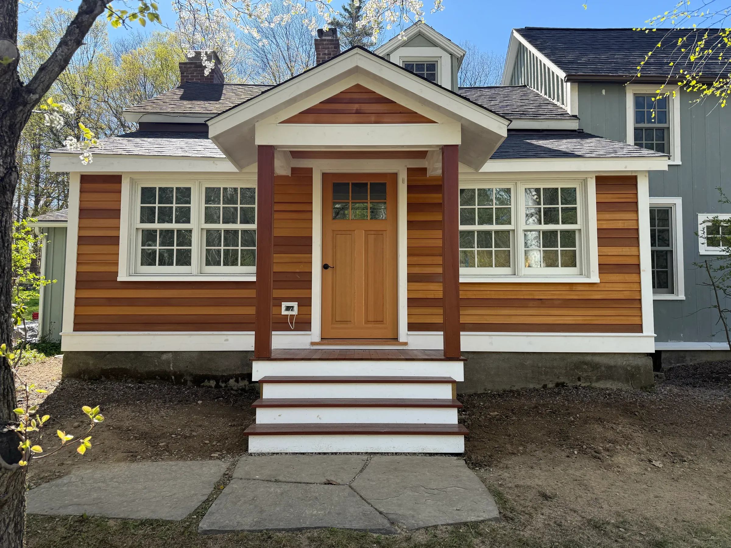 Cedar shake home with entry portico