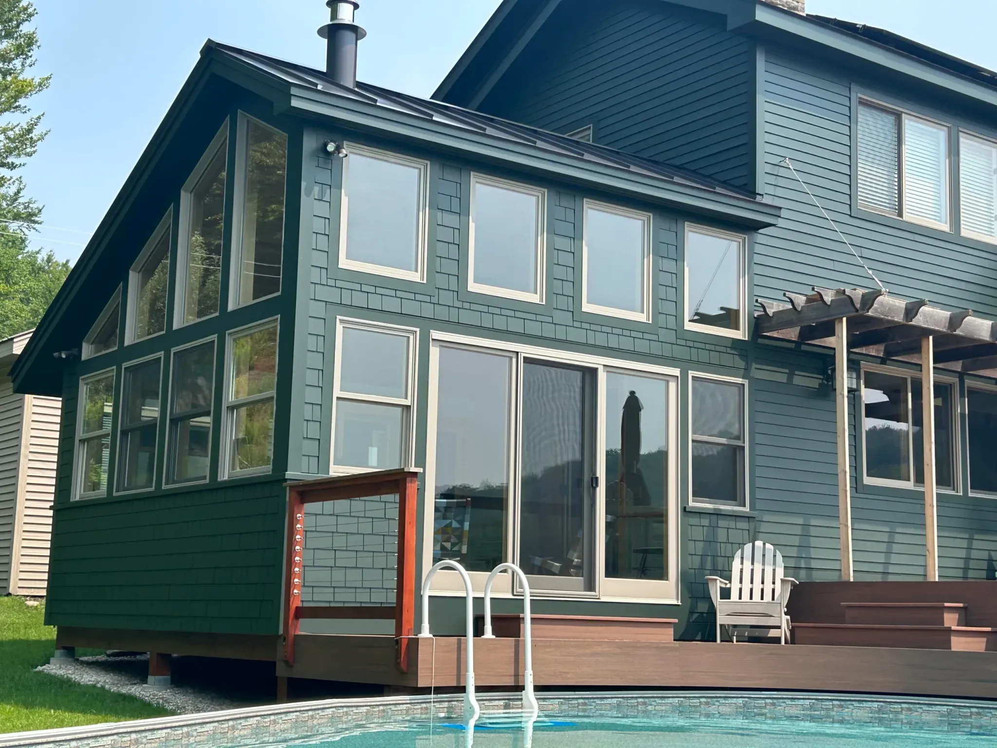 Custom home addition with pool and deck