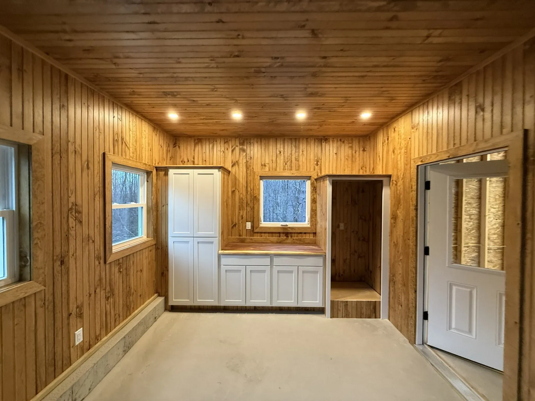 Garage cabana kitchenette with custom built-ins