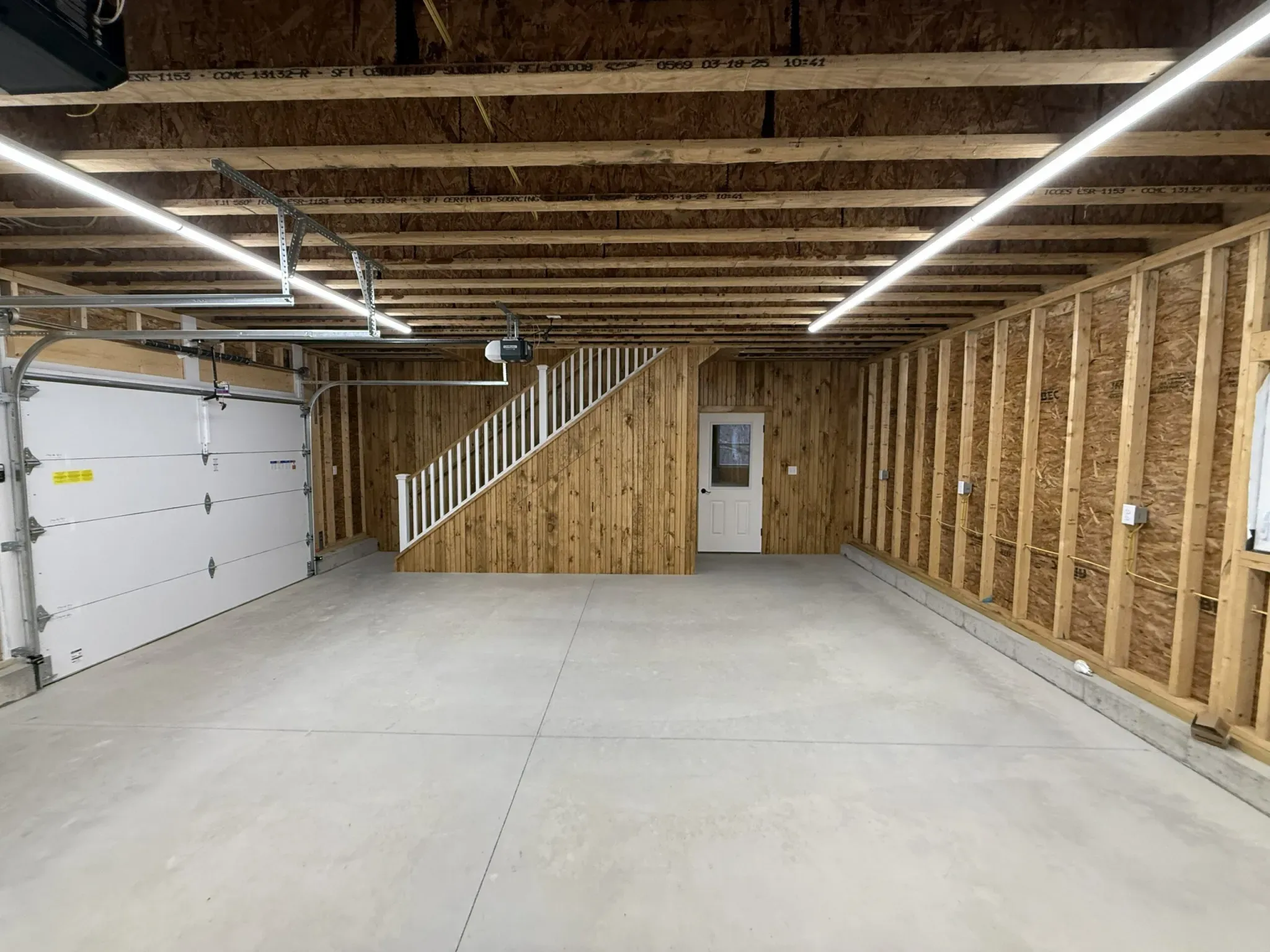 Staircase framing in a custom garage interior