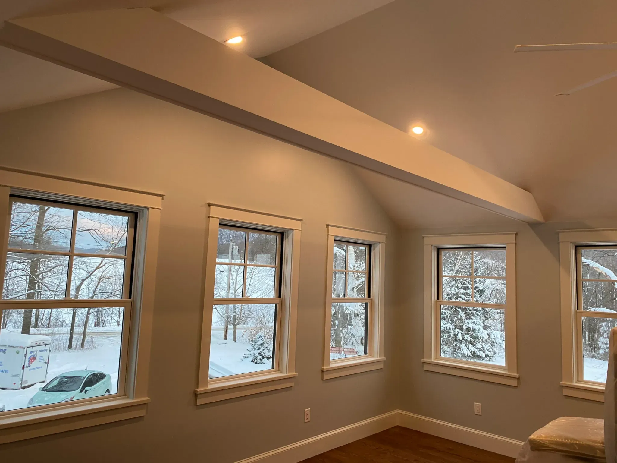 Vaulted ceiling great room with large windows